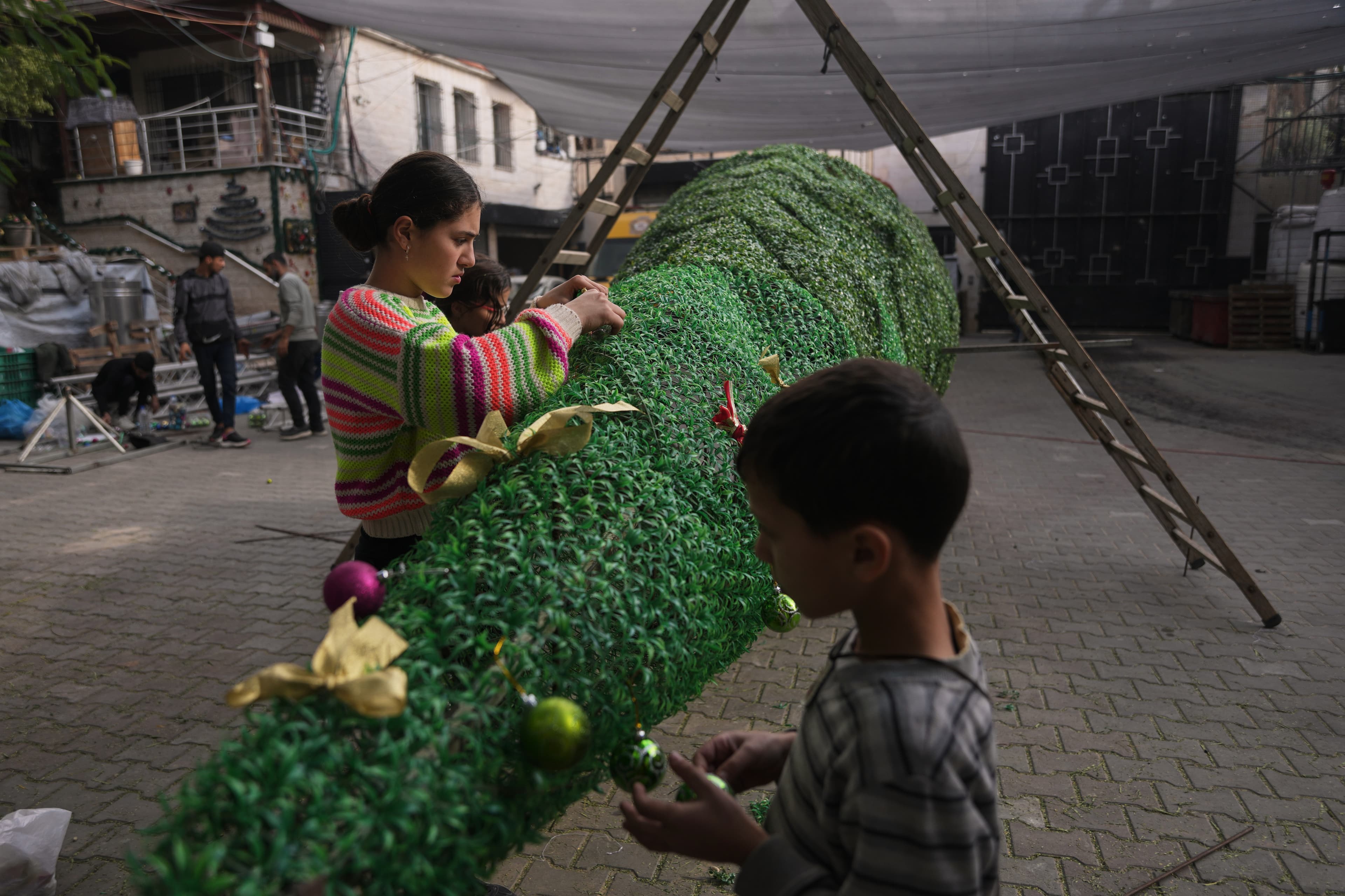 ღაზას ქრისტიანები შობას მშვიდობიანად აღნიშნავენ ომის საფრთხის გარეშე